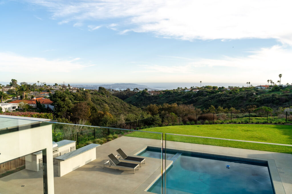 Backyard pool and view of San Diego from a custom home in La Jolla built by Townsgate Construction