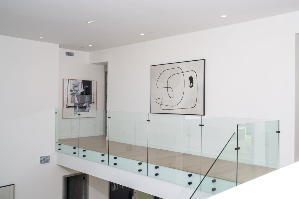 Second floor glass railing of a custom home in San Diego built by Townsgate Construction