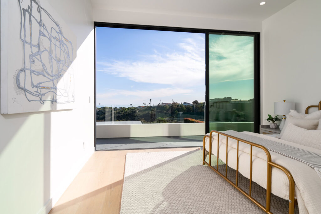 Third bedroom with view of a custom home in San Diego built by Townsgate Construction